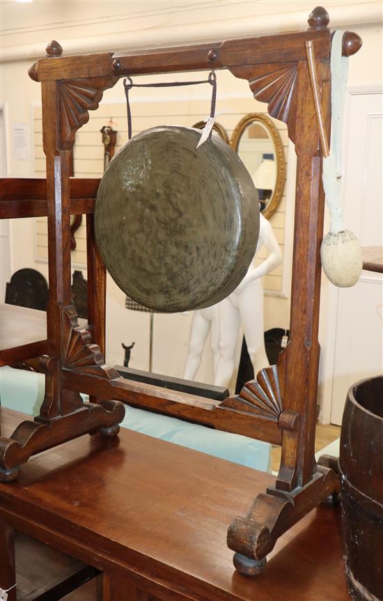 A late Victorian oak framed gong and beater H.98cm